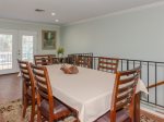 The dining room table seats up to 6 people 